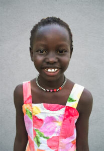 Young girl joined Seeds at age 7.